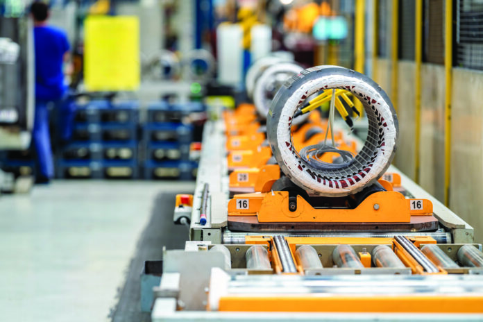 detail of the electric motor on the production line in the factory